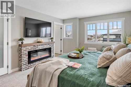 403 Yuel Crescent, Saskatoon, SK - Indoor Photo Showing Living Room With Fireplace