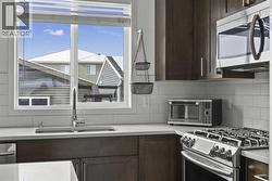 This one even has the coveted kitchen window over the under mount sink! - 