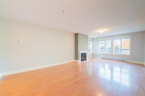 201-1620 Townsite Rd, Nanaimo, BC - Indoor Photo Showing Other Room With Fireplace