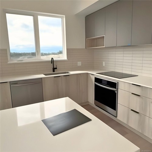 413-3564B Ryder Hesjedal Way, Colwood, BC - Indoor Photo Showing Kitchen With Upgraded Kitchen