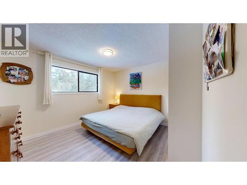 5040 Hansen Court, 108 Mile Ranch, BC - Indoor Photo Showing Bedroom