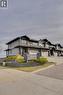 7, 208 Sparrow Hawk Drive, Fort Mcmurray, AB  - Outdoor With Facade 