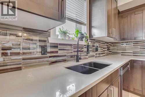 7, 208 Sparrow Hawk Drive, Fort Mcmurray, AB - Indoor Photo Showing Kitchen With Double Sink