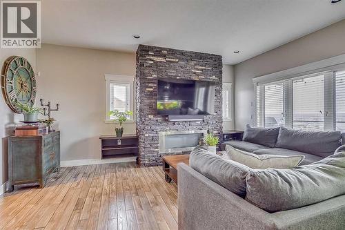 7, 208 Sparrow Hawk Drive, Fort Mcmurray, AB - Indoor Photo Showing Living Room With Fireplace