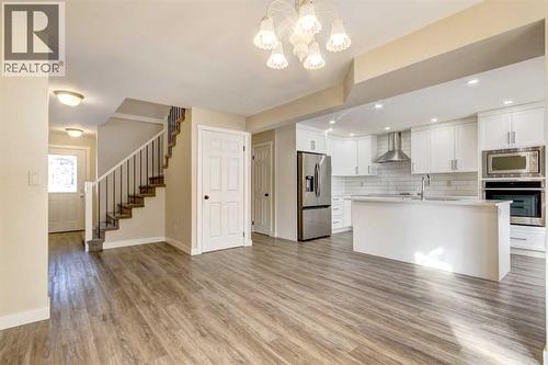83 Hawkfield Crescent Nw, Calgary, AB - Indoor Photo Showing Kitchen With Stainless Steel Kitchen With Double Sink