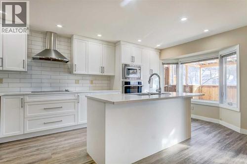 83 Hawkfield Crescent Nw, Calgary, AB - Indoor Photo Showing Kitchen With Upgraded Kitchen