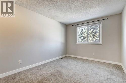 83 Hawkfield Crescent Nw, Calgary, AB - Indoor Photo Showing Other Room