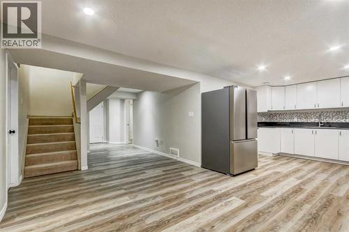 83 Hawkfield Crescent Nw, Calgary, AB - Indoor Photo Showing Kitchen With Double Sink