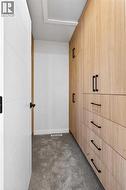 Primary walk in closet with built ins - 
