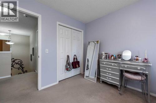 212 Silverado Range Heights Sw, Calgary, AB - Indoor Photo Showing Other Room