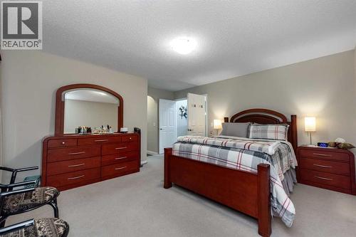 212 Silverado Range Heights Sw, Calgary, AB - Indoor Photo Showing Bedroom