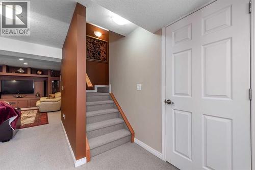 212 Silverado Range Heights Sw, Calgary, AB - Indoor Photo Showing Other Room