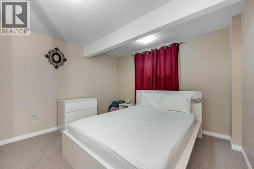 212 Silverado Range Heights Sw, Calgary, AB - Indoor Photo Showing Bedroom