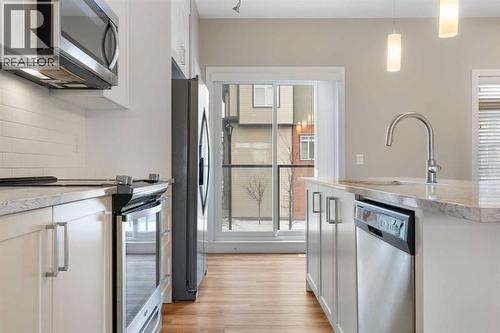 Kitchen, upgraded stainless-steel appliances - 217 Sage Bluff Drive Nw, Calgary, AB - Indoor Photo Showing Kitchen With Upgraded Kitchen