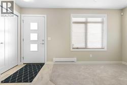 Front entrance, flex room. ceramic tile and carpet - 