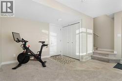 Flex room, entrance to garage, utility room - 