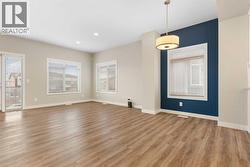 Living and dining room, lots of windows - 