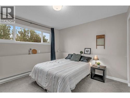First Bedroom - 588 Mccurdy Road, Kelowna, BC - Indoor Photo Showing Bedroom