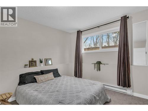 Second Bedroom - 588 Mccurdy Road, Kelowna, BC - Indoor Photo Showing Bedroom