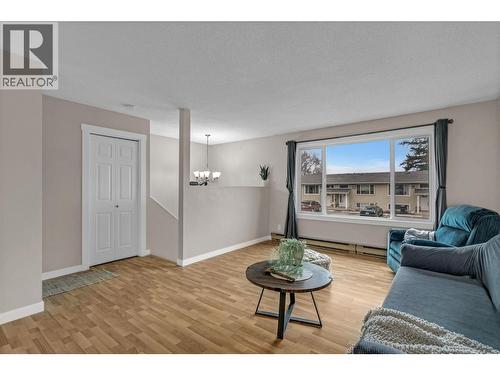 Fresh closet doors with new trim - 588 Mccurdy Road, Kelowna, BC - Indoor Photo Showing Living Room