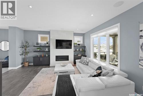 4357 Albulet Drive, Regina, SK - Indoor Photo Showing Living Room With Fireplace