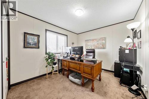 3rd Sizable Bedroom - 4 Spring Dale Circle Se, Airdrie, AB - Indoor Photo Showing Office