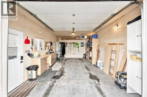 4 Spring Dale Circle Se, Airdrie, AB - Indoor Photo Showing Garage
