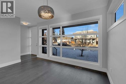 Oversized windows - so much natural light! - 2319 23 Avenue Sw, Calgary, AB - Indoor Photo Showing Other Room