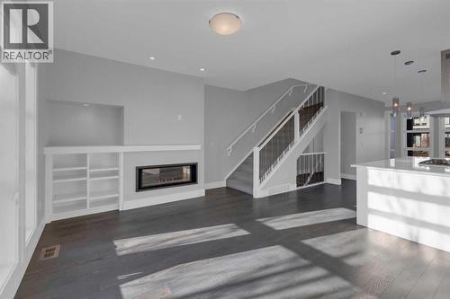2319 23 Avenue Sw, Calgary, AB - Indoor Photo Showing Other Room With Fireplace