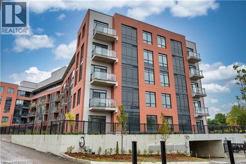 View of building exterior - 1010 Dundas Street E Unit# 524, Whitby, ON - Outdoor With Balcony With Facade