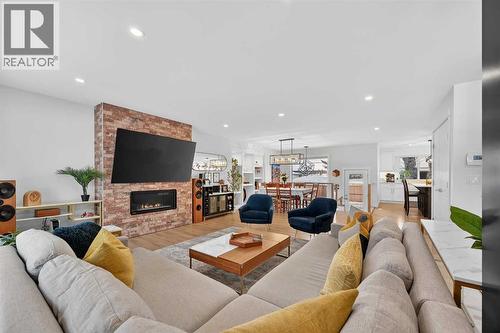 2720 41 Street Sw, Calgary, AB - Indoor Photo Showing Living Room With Fireplace