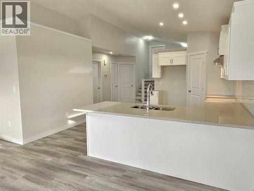 SAMPLE - 9211 94A Avenue, Wembley, AB - Indoor Photo Showing Kitchen With Double Sink