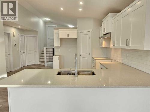 SAMPLE - 9211 94A Avenue, Wembley, AB - Indoor Photo Showing Kitchen With Double Sink
