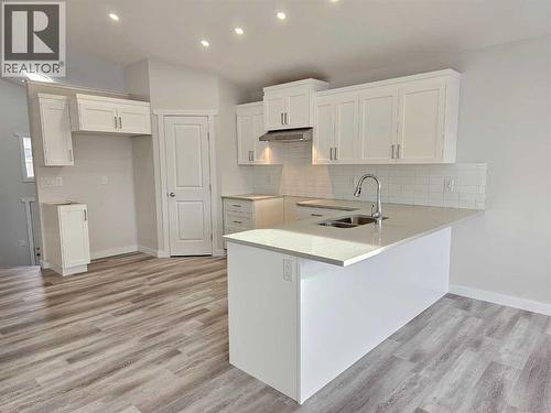 SAMPLE - 9211 94A Avenue, Wembley, AB - Indoor Photo Showing Kitchen With Double Sink