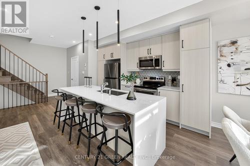 1166 Lloyd Landing Drive E, Milton, ON - Indoor Photo Showing Kitchen With Upgraded Kitchen