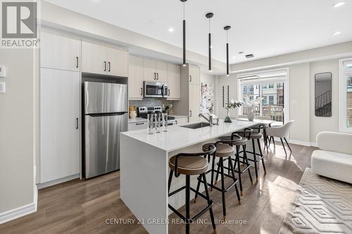 1166 Lloyd Landing Drive E, Milton, ON - Indoor Photo Showing Kitchen With Upgraded Kitchen