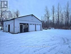 2 BAYS/1 MAN CAVE HEAT/AC W/ABILITY TO WORK ON ATV - 