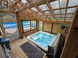 HOT TUB IN COVERED PORCH - 