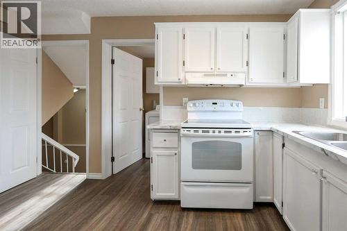 70 Mclevin Crescent, Red Deer, AB - Indoor Photo Showing Kitchen With Double Sink