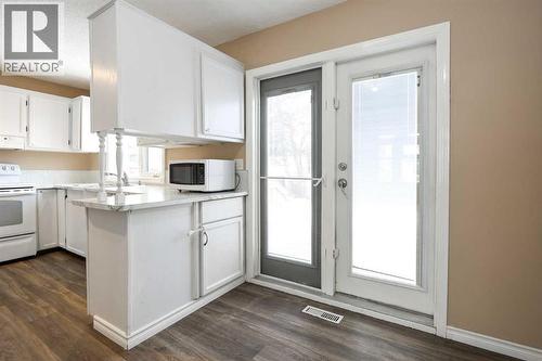 70 Mclevin Crescent, Red Deer, AB - Indoor Photo Showing Kitchen With Double Sink