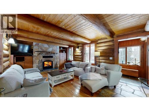 7671 Rutherford Road, Bridge Lake, BC - Indoor Photo Showing Living Room With Fireplace