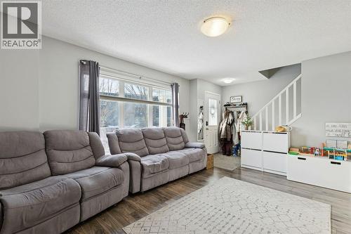 996 Windsong Drive Sw, Airdrie, AB - Indoor Photo Showing Living Room