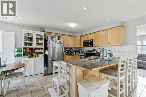 996 Windsong Drive Sw, Airdrie, AB - Indoor Photo Showing Kitchen