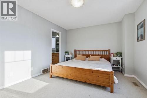 996 Windsong Drive Sw, Airdrie, AB - Indoor Photo Showing Bedroom