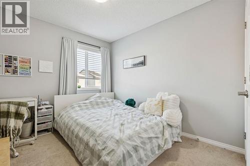 996 Windsong Drive Sw, Airdrie, AB - Indoor Photo Showing Bedroom