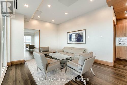 2221 - 30 Shore Breeze Drive, Toronto, ON - Indoor Photo Showing Living Room