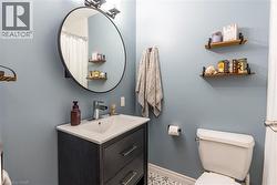 Full bathroom with vanity and curtained shower - 