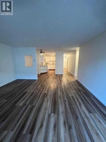 Open-Concept LivingRoom to Kitchen - 404, 1234 14 Avenue Sw, Calgary, AB - Indoor Photo Showing Other Room