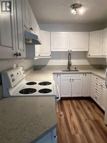 Stove - 404, 1234 14 Avenue Sw, Calgary, AB - Indoor Photo Showing Kitchen