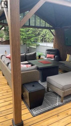 12' X 12' Year Round Gazebo w/ Feature Wall & 60"TV - 7 Mountain Park Circle Se, Calgary, AB - Outdoor With Deck Patio Veranda With Exterior